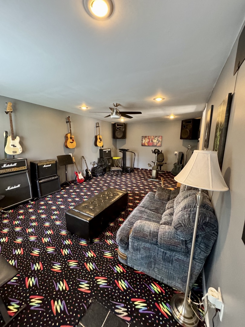 301 West Jackson Street Ohio, IL 61349 - Photo 15 of 32 a living room with furniture and a lamp