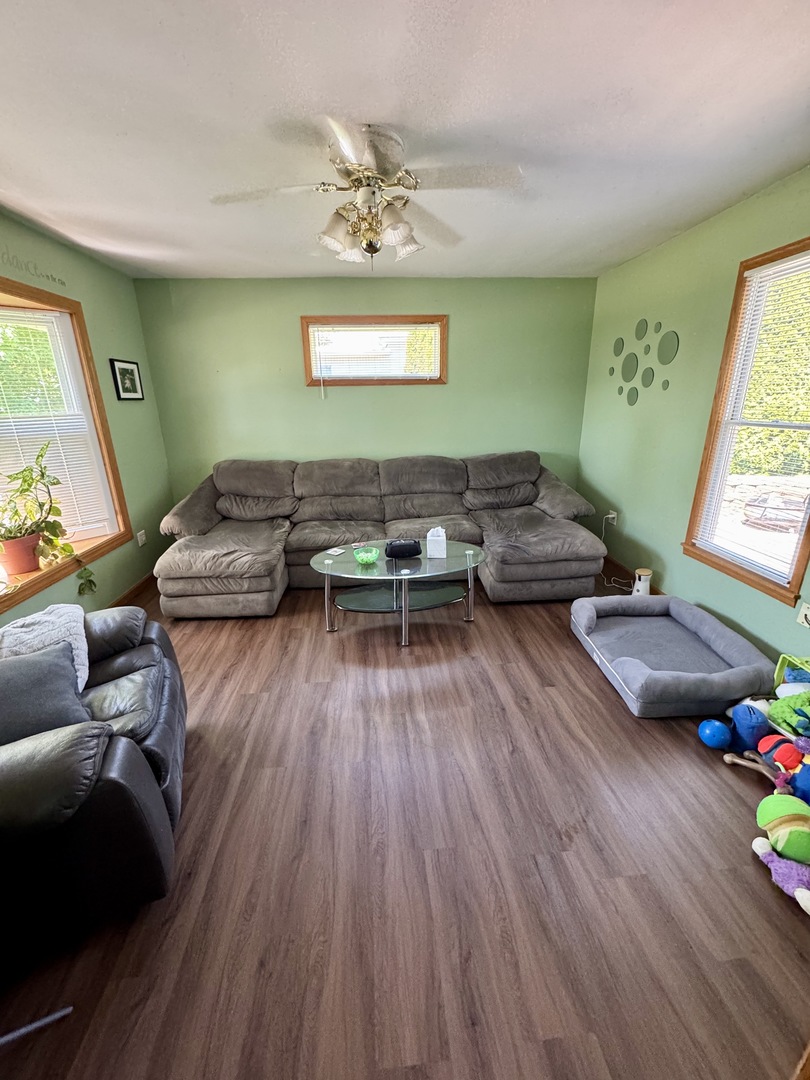 301 West Jackson Street Ohio, IL 61349 - Photo 22 of 32 a living room with furniture and a wooden floor