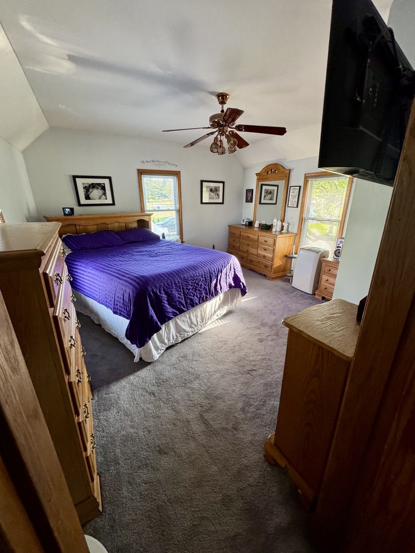 301 West Jackson Street Ohio, IL 61349 - Photo 27 of 32 a bed room with a bed