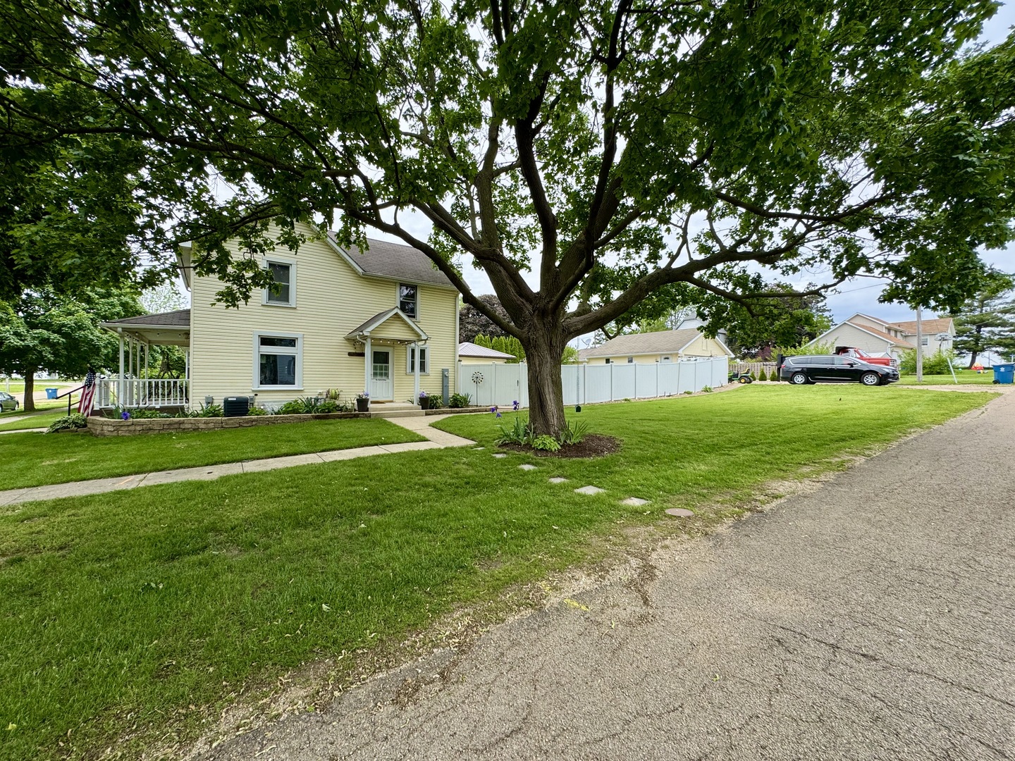301 West Jackson Street Ohio, IL 61349 - Photo 32 of 32 a view of a house with a big yard and large tree