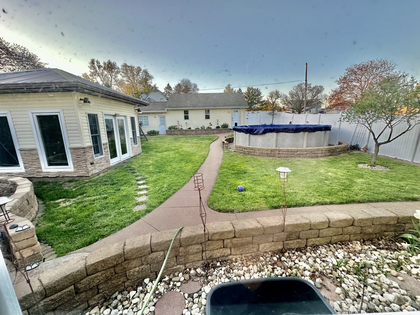 301 West Jackson Street Ohio, IL 61349 - Photo 5 of 32 a view of a porch with a yard