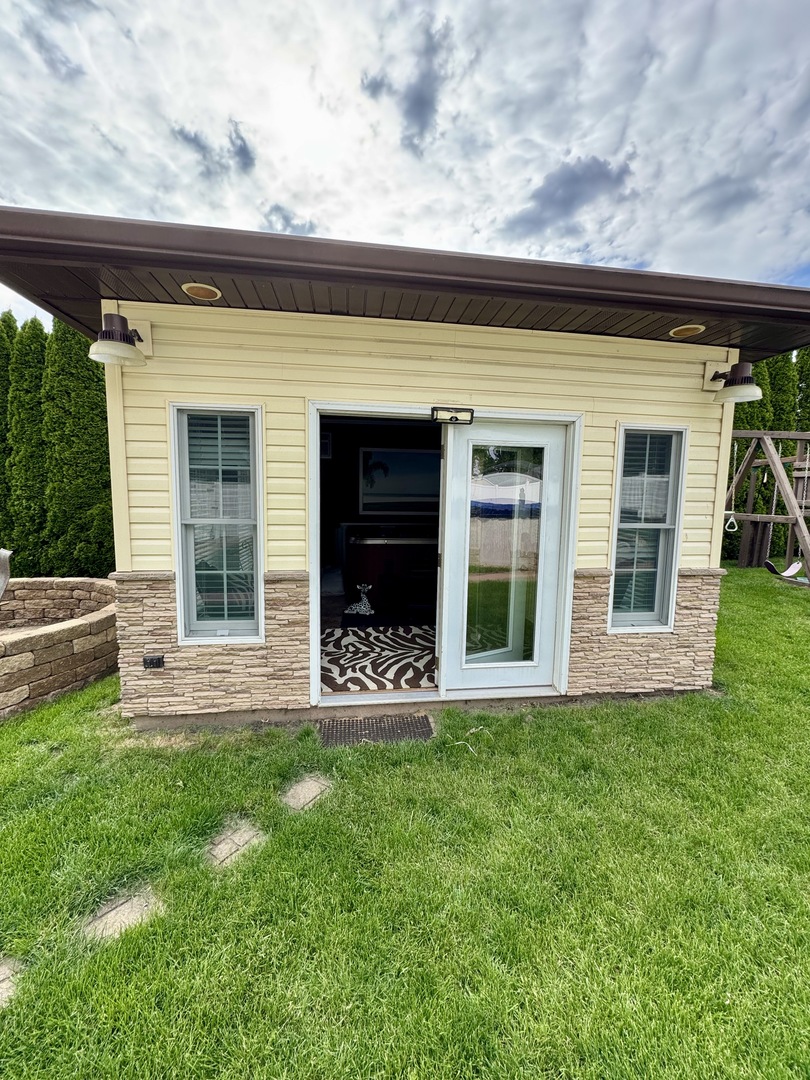301 West Jackson Street Ohio, IL 61349 - Photo 7 of 32 a front view of a house with a yard