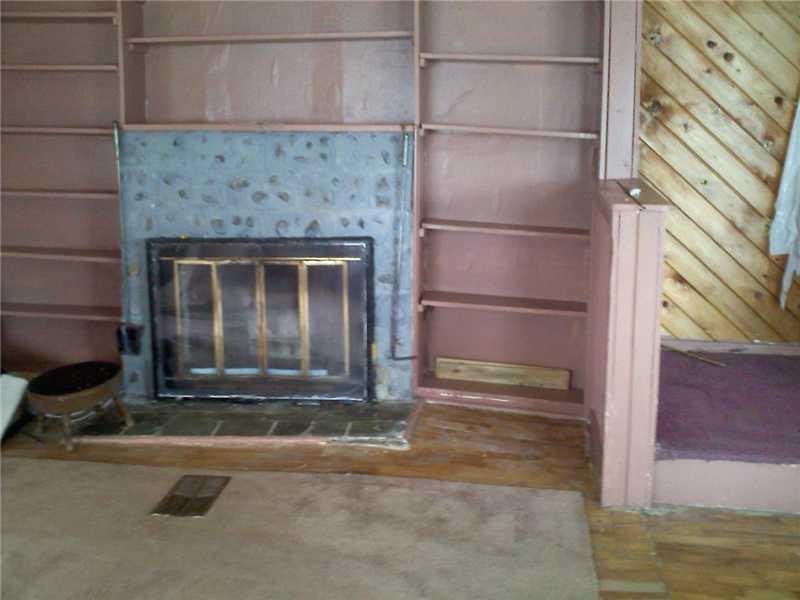 22 Cold Brook Road Sherman, ME 04776 - Photo 9 of 13 Living Room.