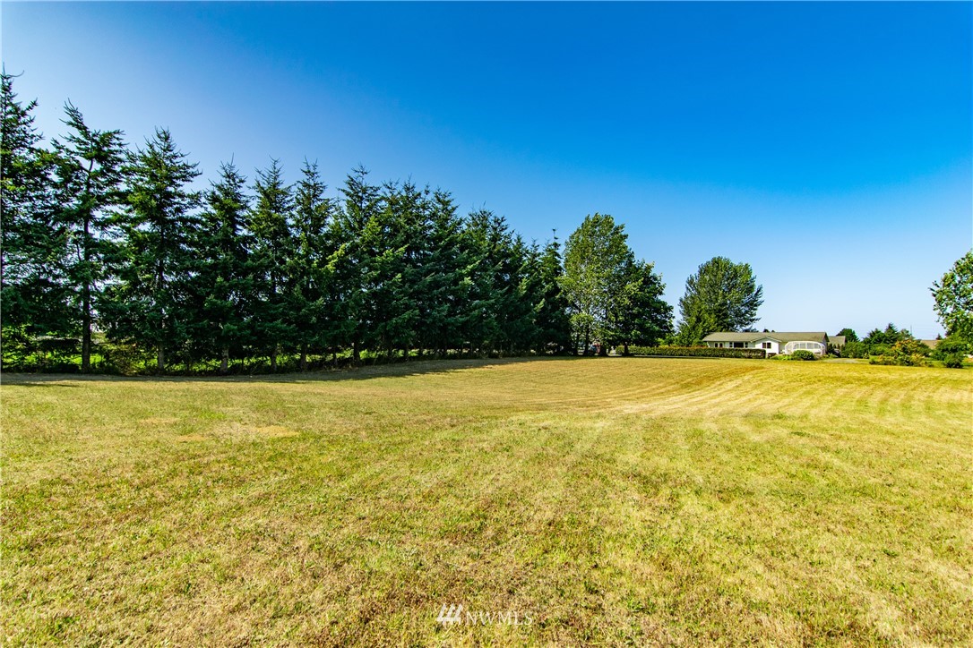 9999 Donaper Road Sequim, WA 98382 - Photo 20 of 24 a view of an outdoor space and swimming pool