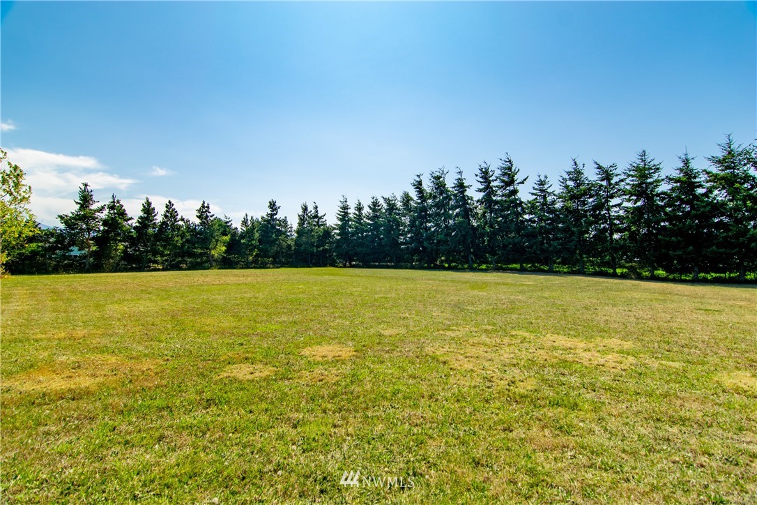 9999 Donaper Road Sequim, WA 98382 - Photo 21 of 24 a view of an outdoor space and swimming pool