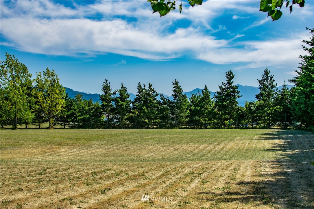 9999 Donaper Road Sequim, WA 98382 - Photo 6 of 24 a view of a lake