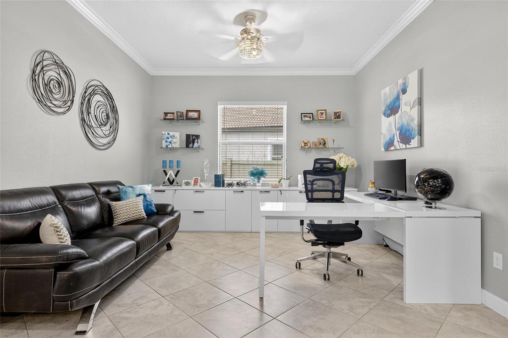 16805 Banner Shell Place Wimauma, FL 33598 - Photo 18 of 44 a living room with furniture and a window