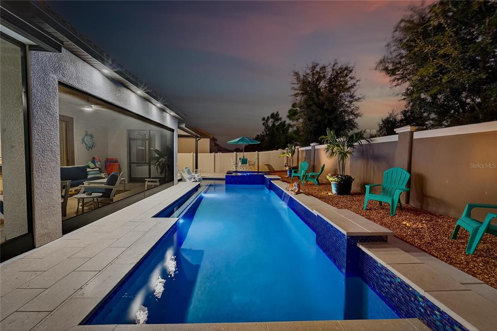 16805 Banner Shell Place Wimauma, FL 33598 - Photo 34 of 44 a view of a living room and kitchen