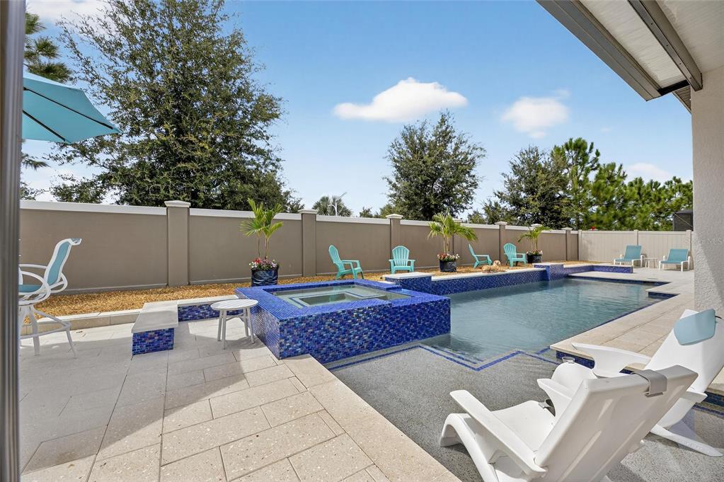 16805 Banner Shell Place Wimauma, FL 33598 - Photo 41 of 44 a view of outdoor sitting area with swimming pool