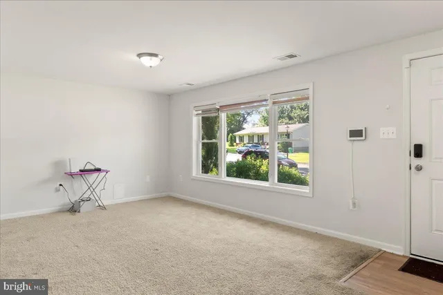 an empty room with a window