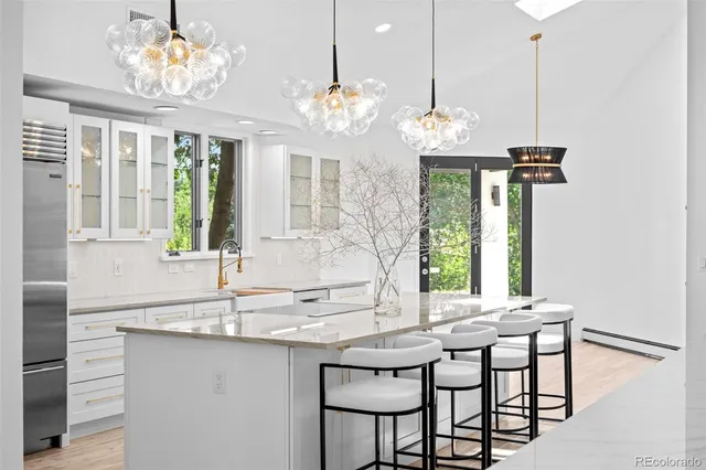 a living room with furniture rug and window