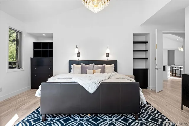 a bathroom with 2 sink and a mirror