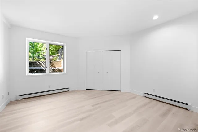 a view of a patio with wooden floor