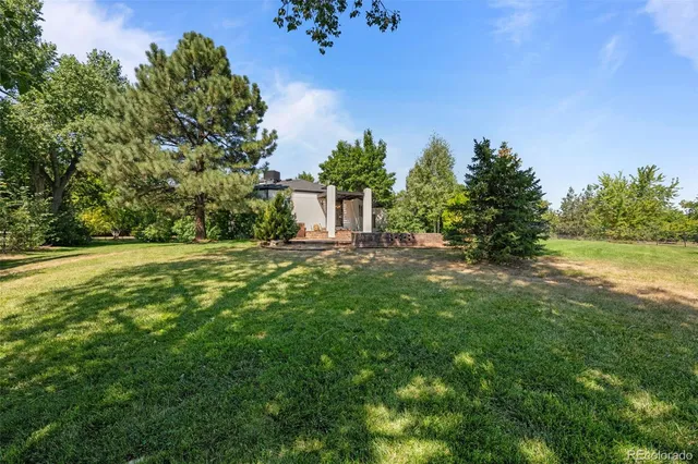 a view of a house with a roof deck