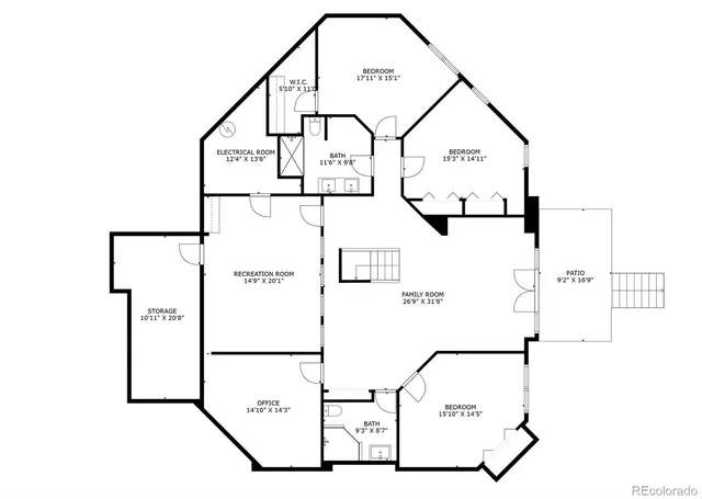 a view of a lake with lawn chairs under an umbrella