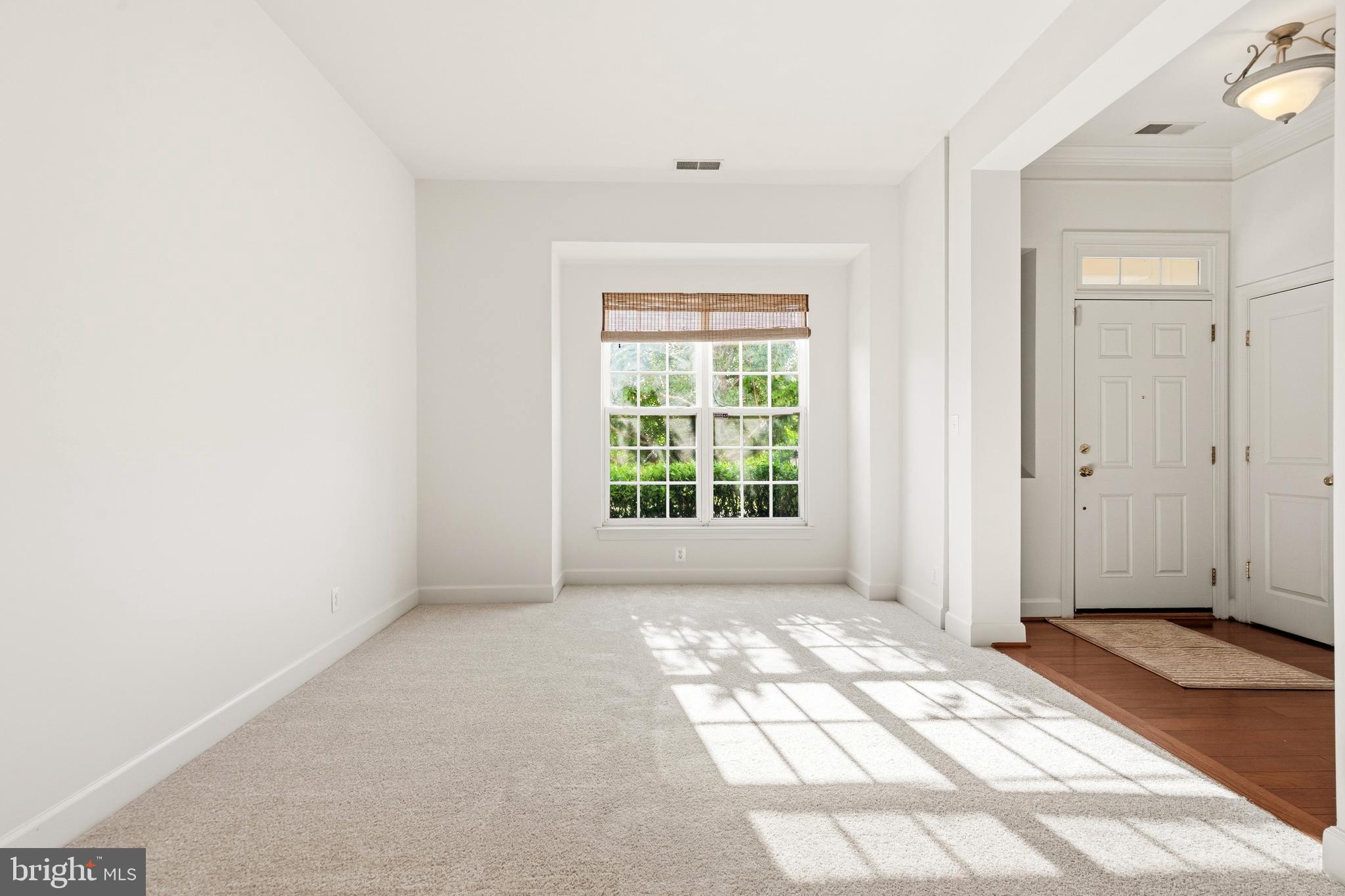 9227 Ribbon Falls Loop Bristow, VA 20136 - Photo 12 of 53 a view of livingroom with window