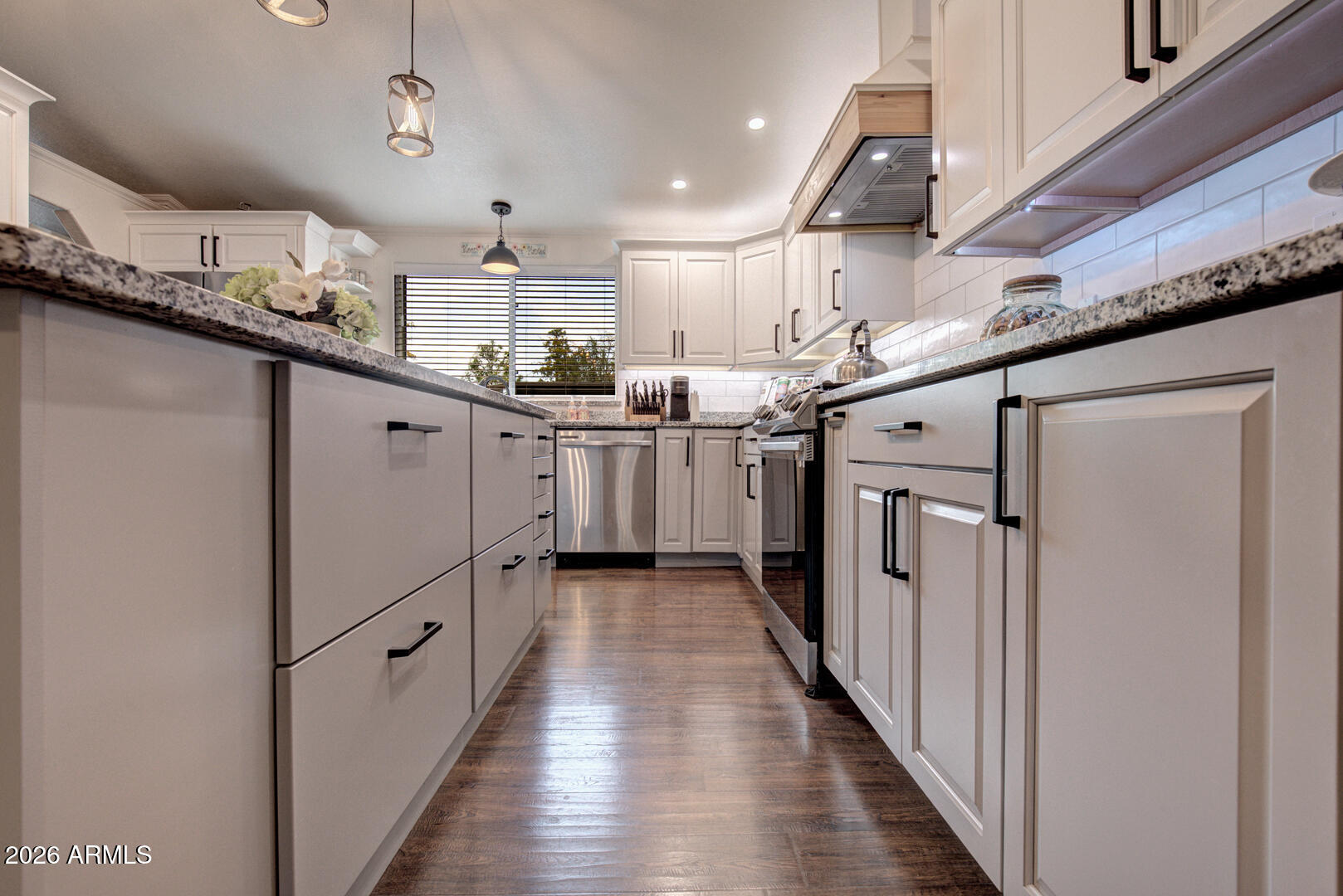 904 North McLane Road Payson, AZ 85541 - Photo 11 of 59 a kitchen with stainless steel appliances granite countertop a sink and cabinets