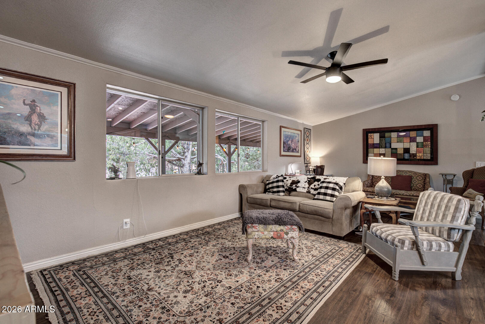 904 North McLane Road Payson, AZ 85541 - Photo 18 of 59 a living room with furniture and a rug