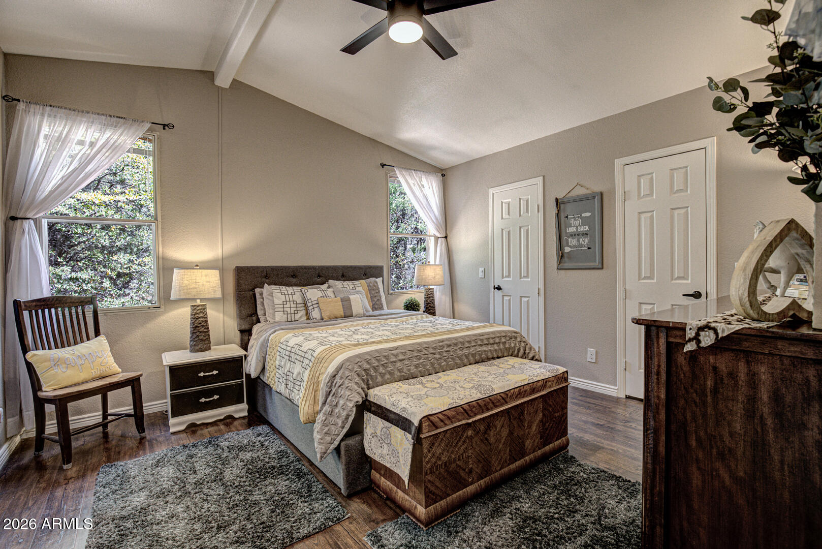 904 North McLane Road Payson, AZ 85541 - Photo 21 of 59 a bed room with a bed and a chair