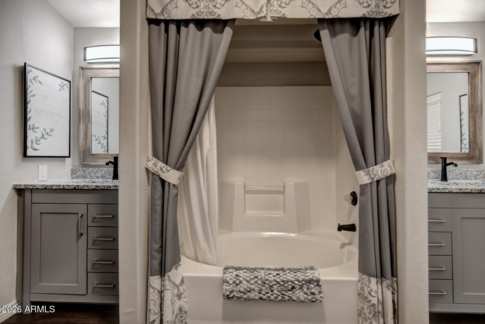 904 North McLane Road Payson, AZ 85541 - Photo 23 of 59 a bathroom with a granite countertop sink a vanity and a mirror