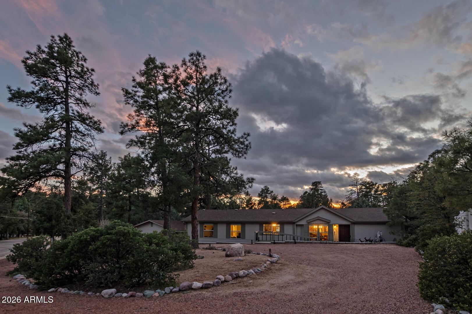 904 North McLane Road Payson, AZ 85541 - Photo 28 of 59 a view of house with outdoor space and swimming pool