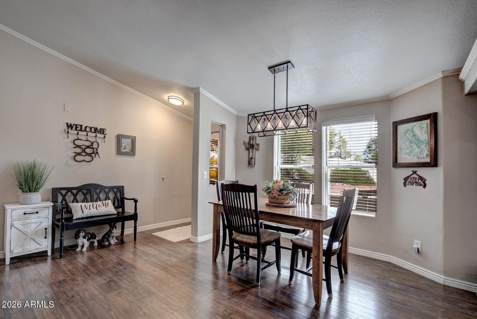 904 North McLane Road Payson, AZ 85541 - Photo 29 of 59 a view of a dining room with furniture window and wooden floor
