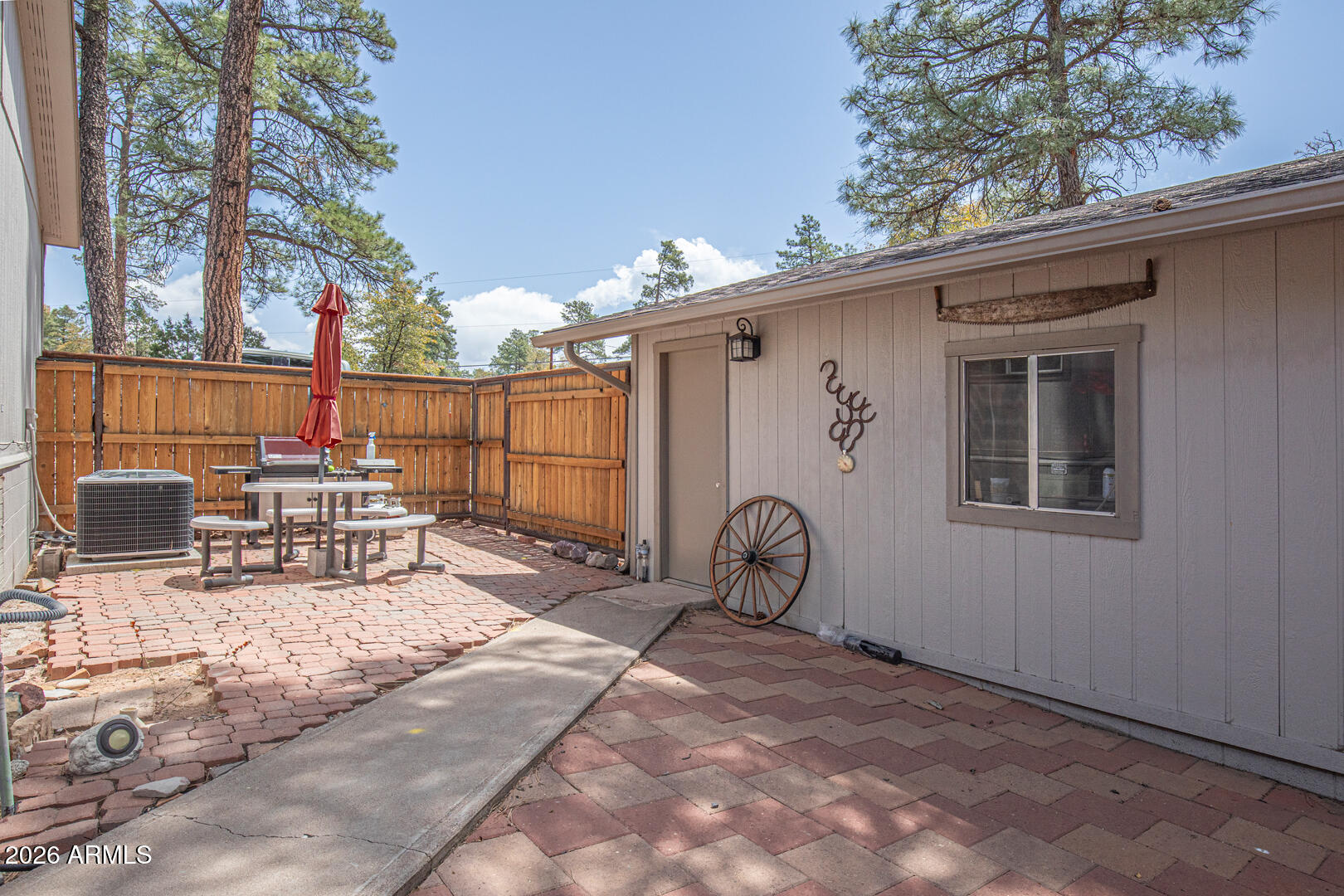 904 North McLane Road Payson, AZ 85541 - Photo 38 of 59 a view of a patio with a table and chairs
