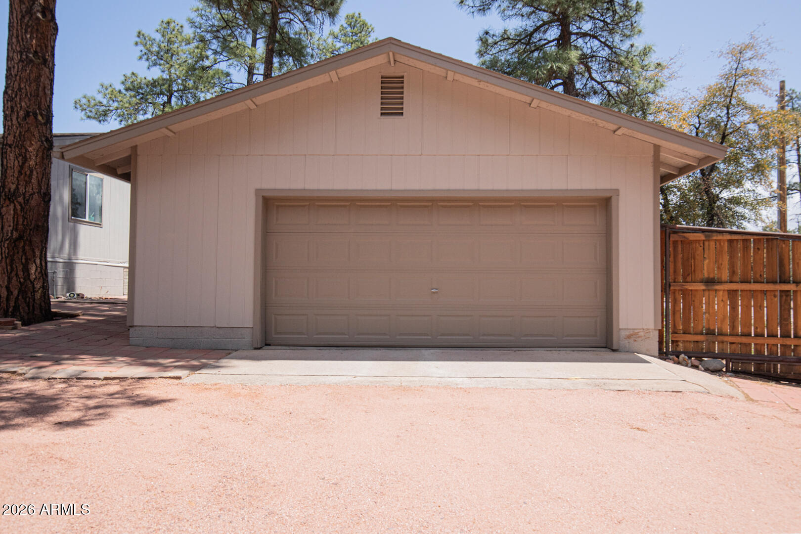 904 North McLane Road Payson, AZ 85541 - Photo 39 of 59 a front view of a house with a garage