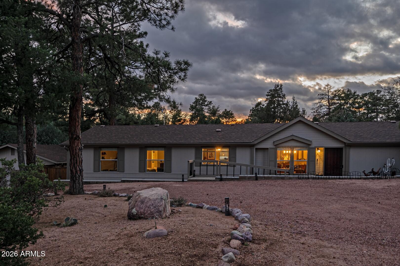 904 North McLane Road Payson, AZ 85541 - Photo 54 of 59 a front view of a house with a yard