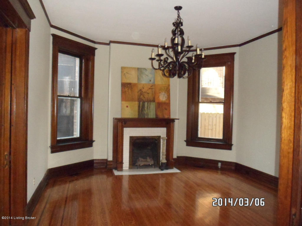 1238 Cherokee Road Louisville, KY 40204 - Photo 9 of 57 Ah...this is THE place for family gatherings, entertaining at Derby or for a romantic diner...just 2! Gorgeous 36' chandelier was custom ordered for this room! We love the way the bay window cradles the decorative fireplace!