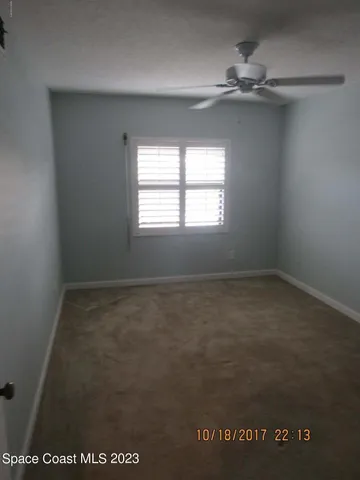 a bathroom with a sink a toilet and a shower