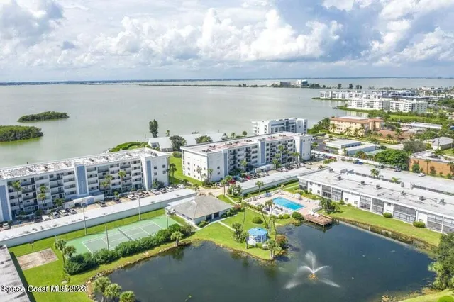 a view of a livingroom with furniture and window