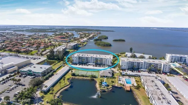 an aerial view of a chairs and table on the terrace