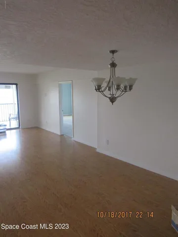 a view of a room with an entryway