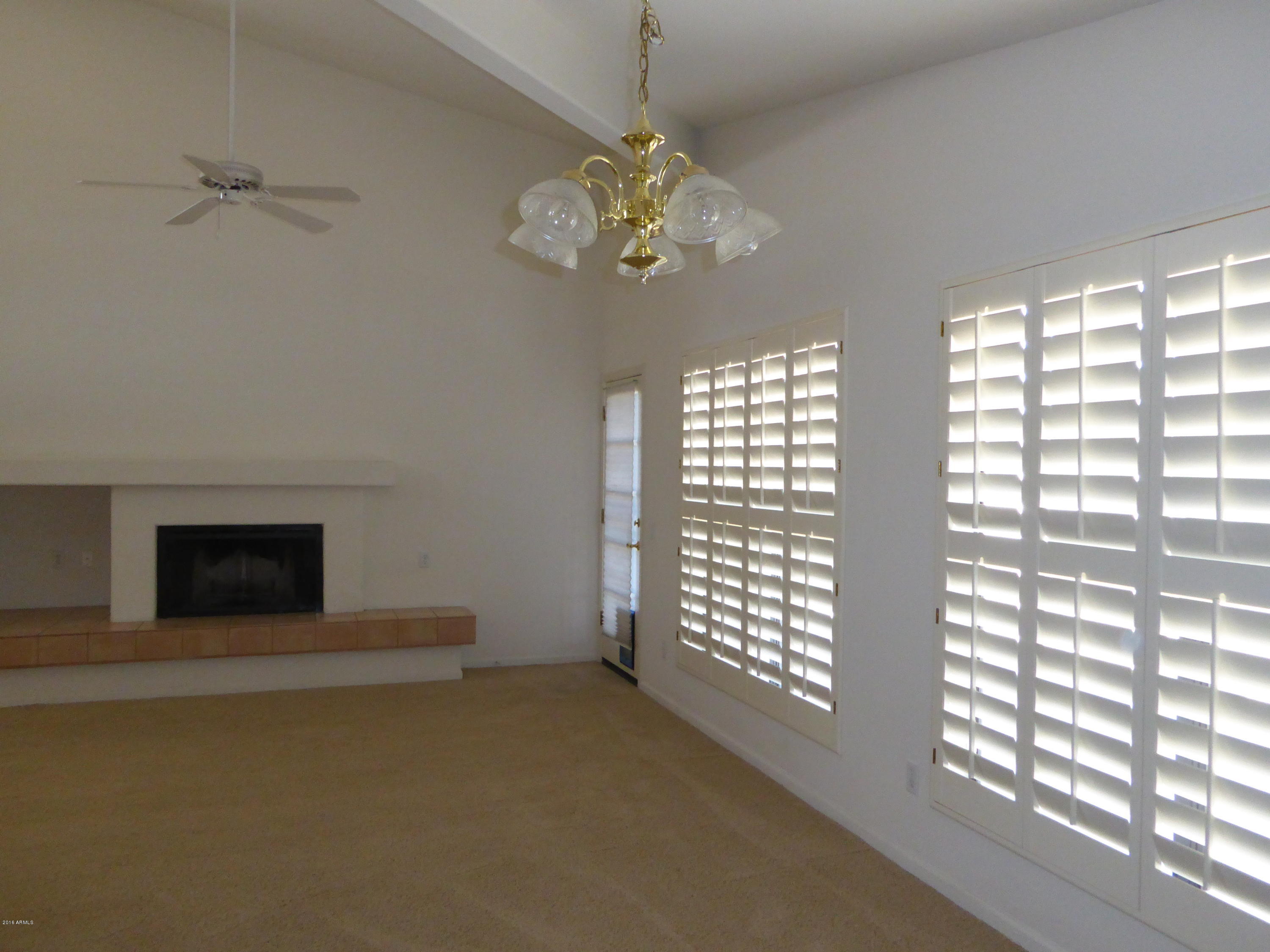 1538 East Winged Foot Road Phoenix, AZ 85022 - Photo 3 of 20 Living room from DR