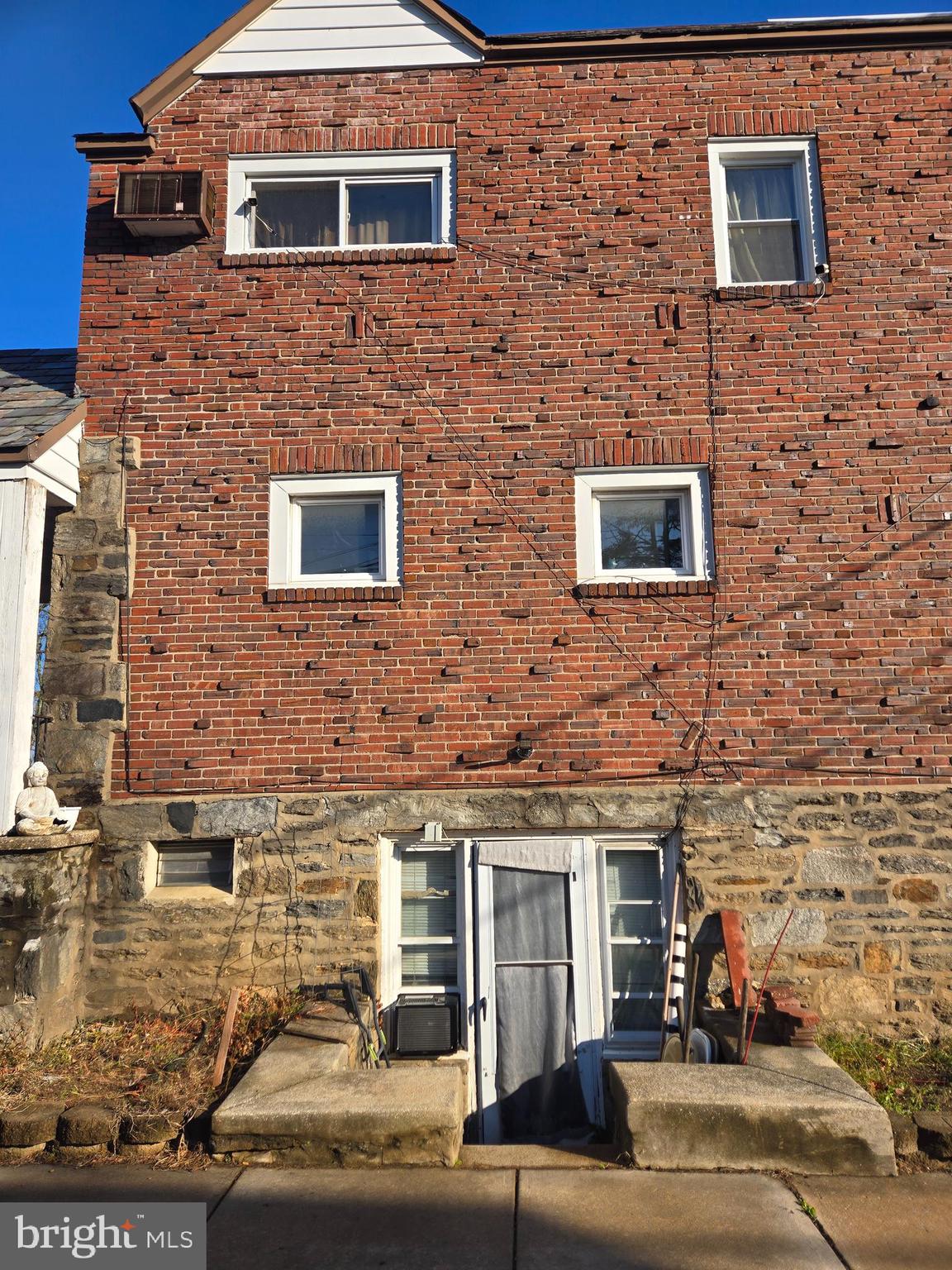201 St Laurence Road Upper Darby, PA 19082 - Photo 6 of 37 a view of a brick building with many windows