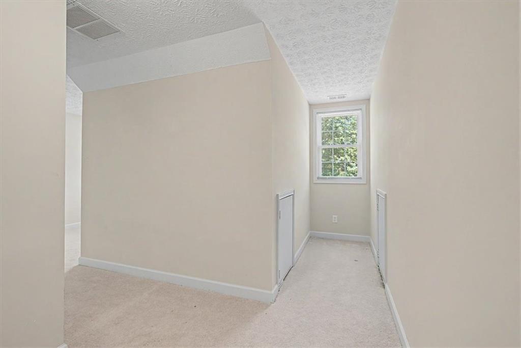 1136 Cole Lake Road Dallas, GA 30157 - Photo 41 of 72 an empty room with a window
