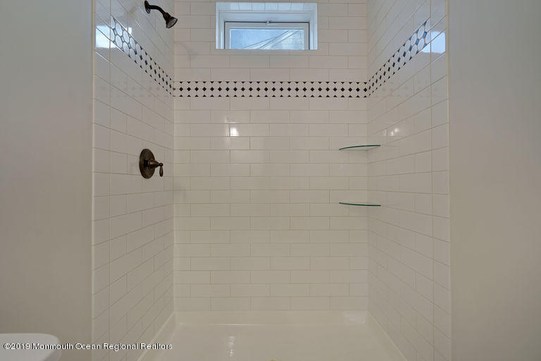 109 Leeward Road Manahawkin, NJ 08050 - Photo 50 of 71 a bathroom with a shower