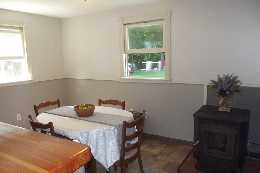 186 Brookfield Road Charlton, MA 01507 - Photo 18 of 28 a bedroom with two beds and a potted plant