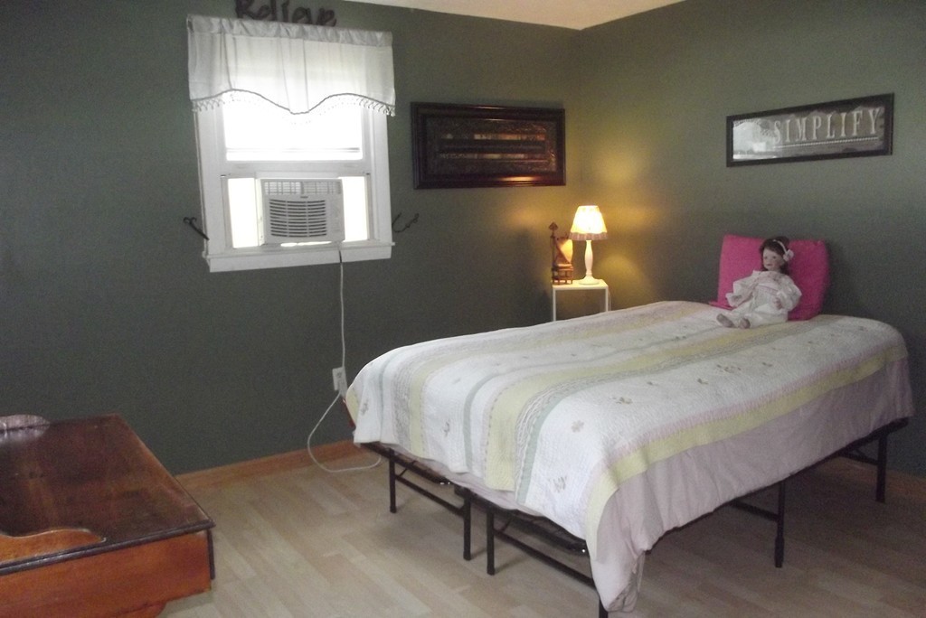 186 Brookfield Road Charlton, MA 01507 - Photo 25 of 28 a bedroom with a bed and a window