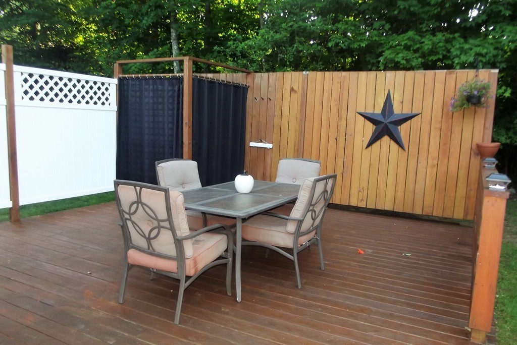 186 Brookfield Road Charlton, MA 01507 - Photo 5 of 28 a view of a dinning table and chairs in the patio