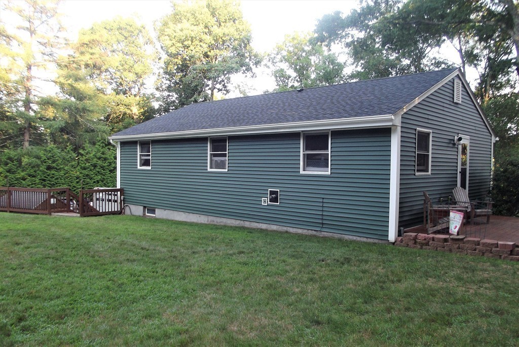 186 Brookfield Road Charlton, MA 01507 - Photo 7 of 28 a view of a backyard with a garden