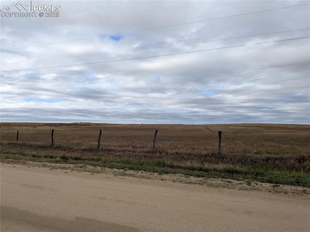 33670 Truckton Road Yoder, CO 80864 - Photo 3 of 3 a view of a yard with wooden fence
