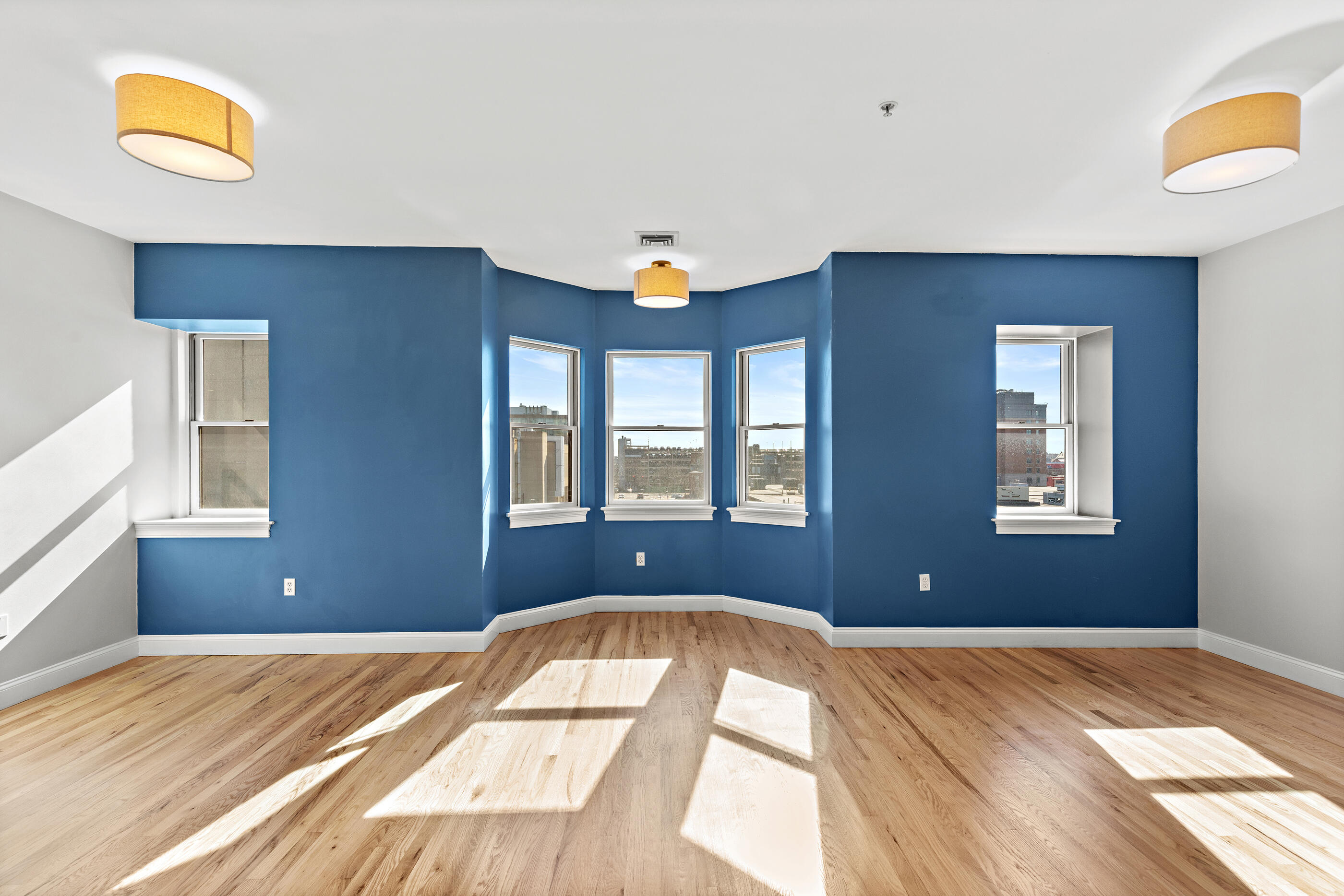 877 Harrison Avenue, Unit 7 Boston, MA 02118 - Photo 14 of 34 a bedroom with a bed and a window