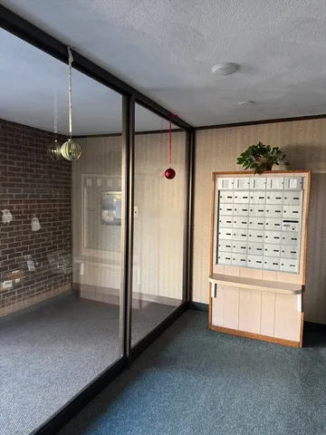 a kitchen with cabinets and window