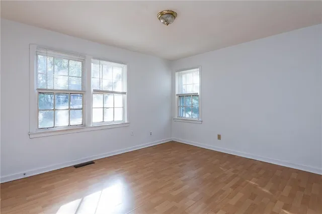 an empty room with windows