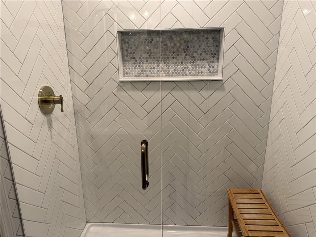 1610 Old Mill Crossing Northeast Marietta, GA 30062 - Photo 15 of 55 a bathroom with a shower