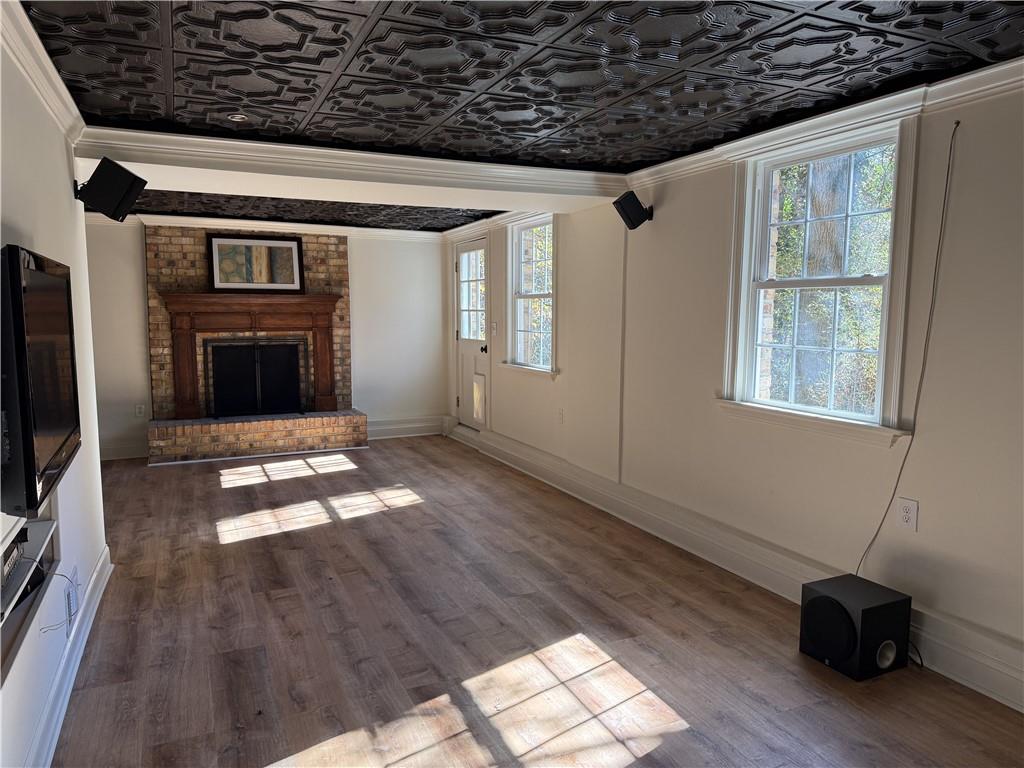 1610 Old Mill Crossing Northeast Marietta, GA 30062 - Photo 33 of 55 a view of a livingroom with wooden floor and a fireplace