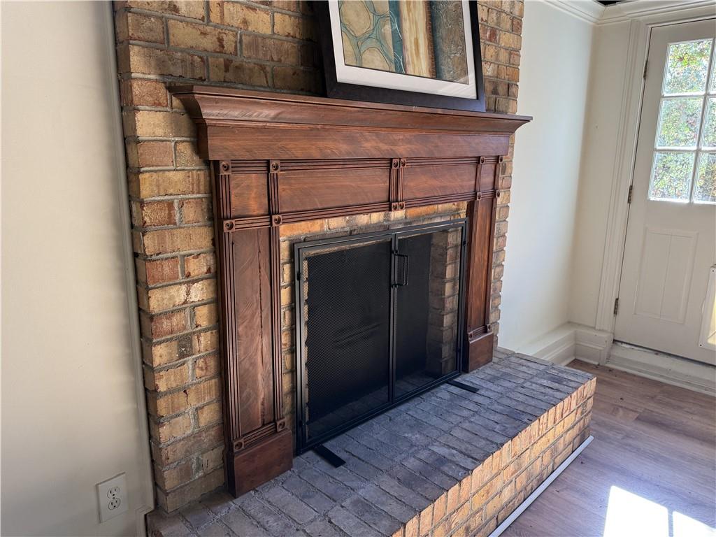 1610 Old Mill Crossing Northeast Marietta, GA 30062 - Photo 37 of 55 a bedroom with a bed and a window