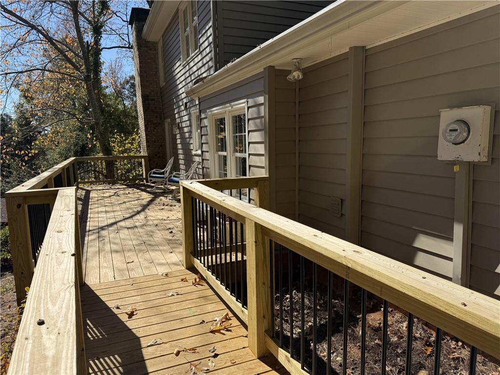 1610 Old Mill Crossing Northeast Marietta, GA 30062 - Photo 4 of 55 a view of balcony with wooden floor and seating space